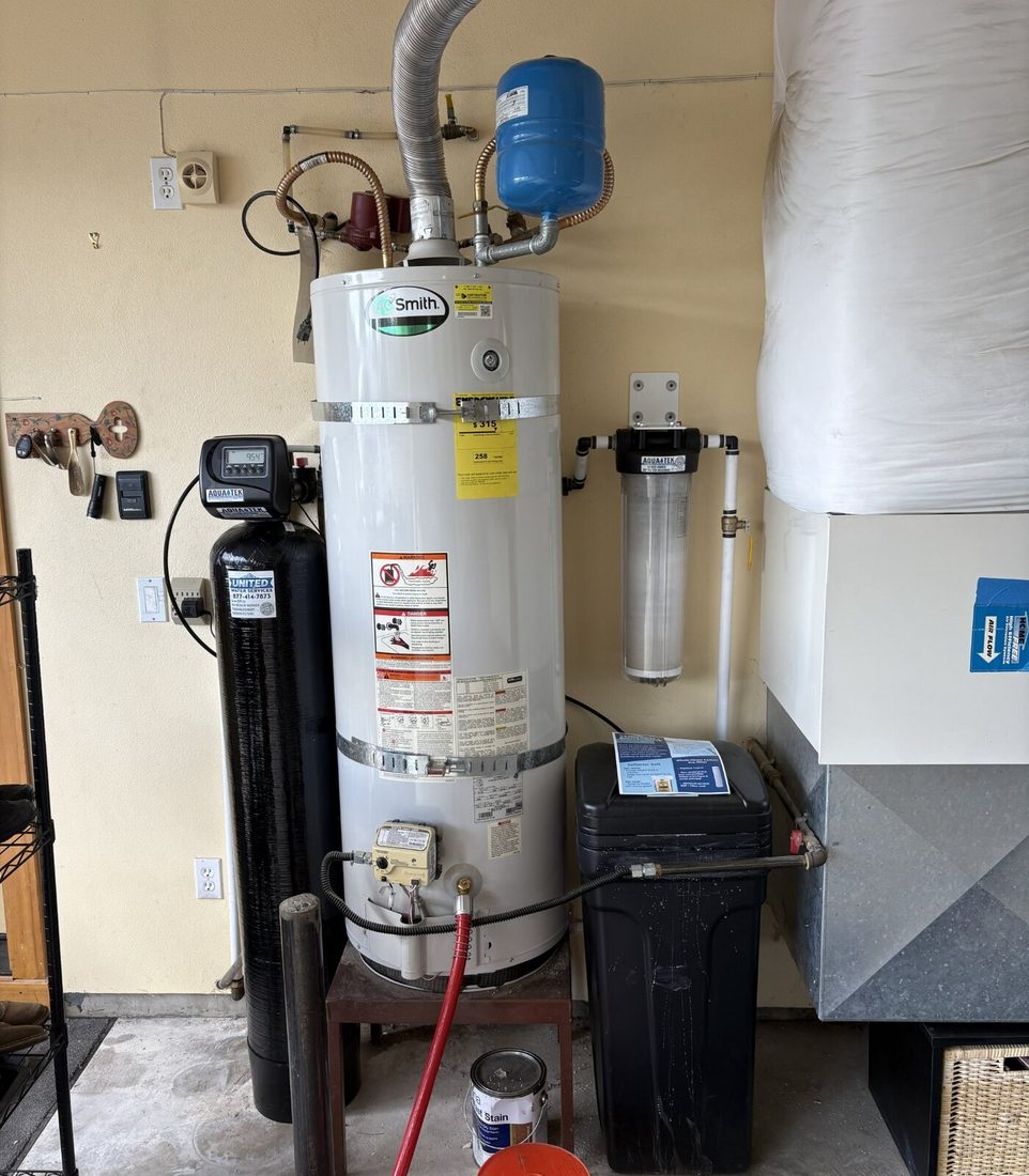 Clean tank water heater installation with updated connections